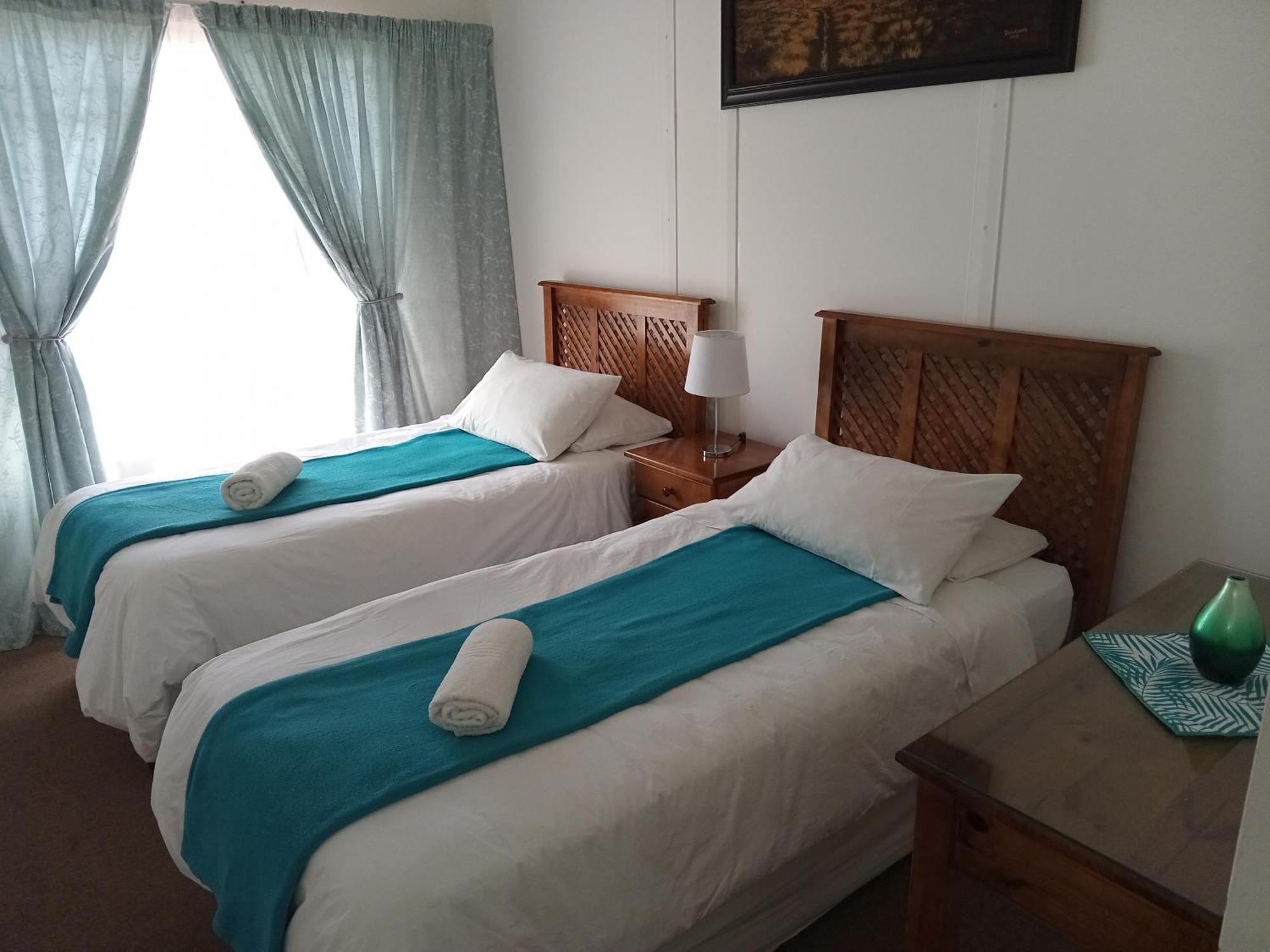 Sunrose Group Of Guesthouses Гарьеп-Дам Экстерьер фото
