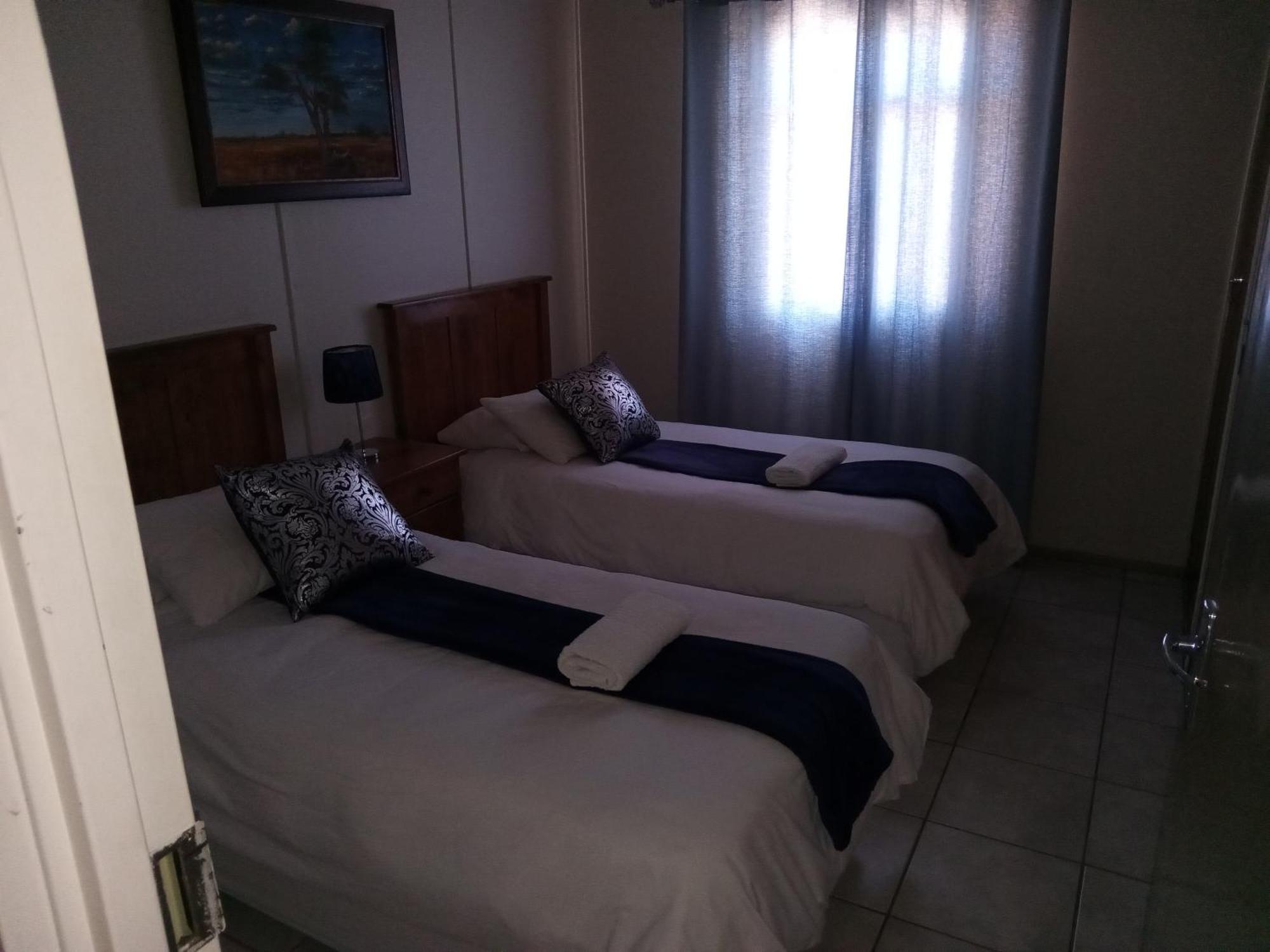 Sunrose Group Of Guesthouses Гарьеп-Дам Экстерьер фото