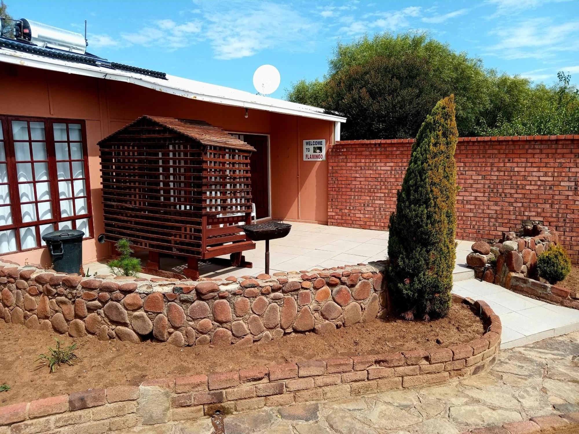 Sunrose Group Of Guesthouses Гарьеп-Дам Экстерьер фото