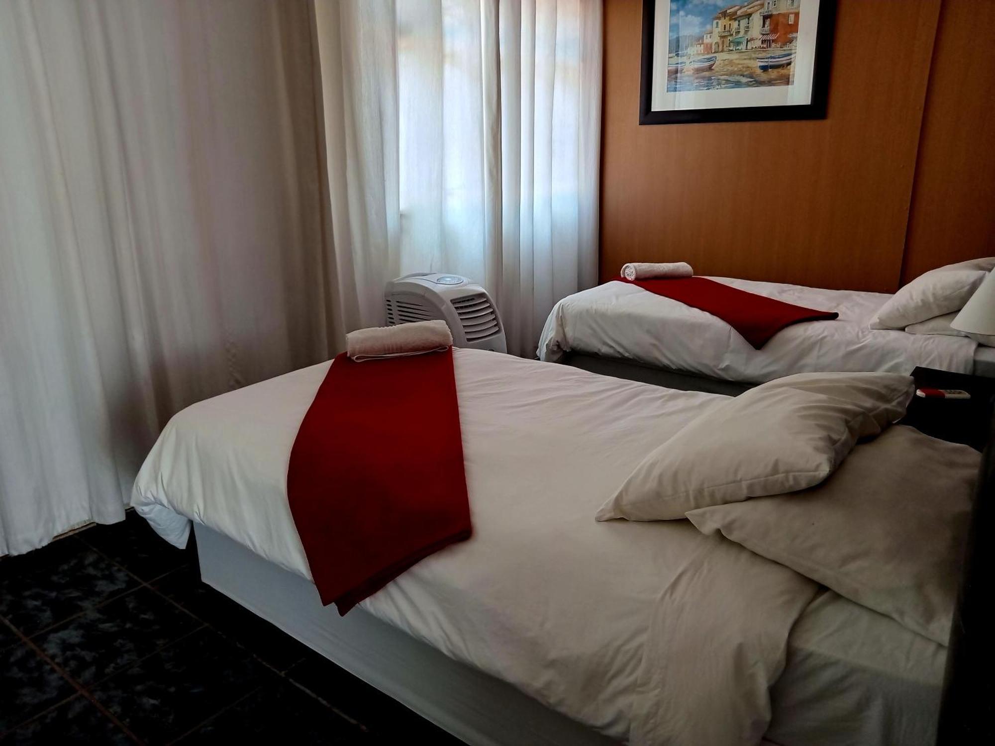 Sunrose Group Of Guesthouses Гарьеп-Дам Экстерьер фото