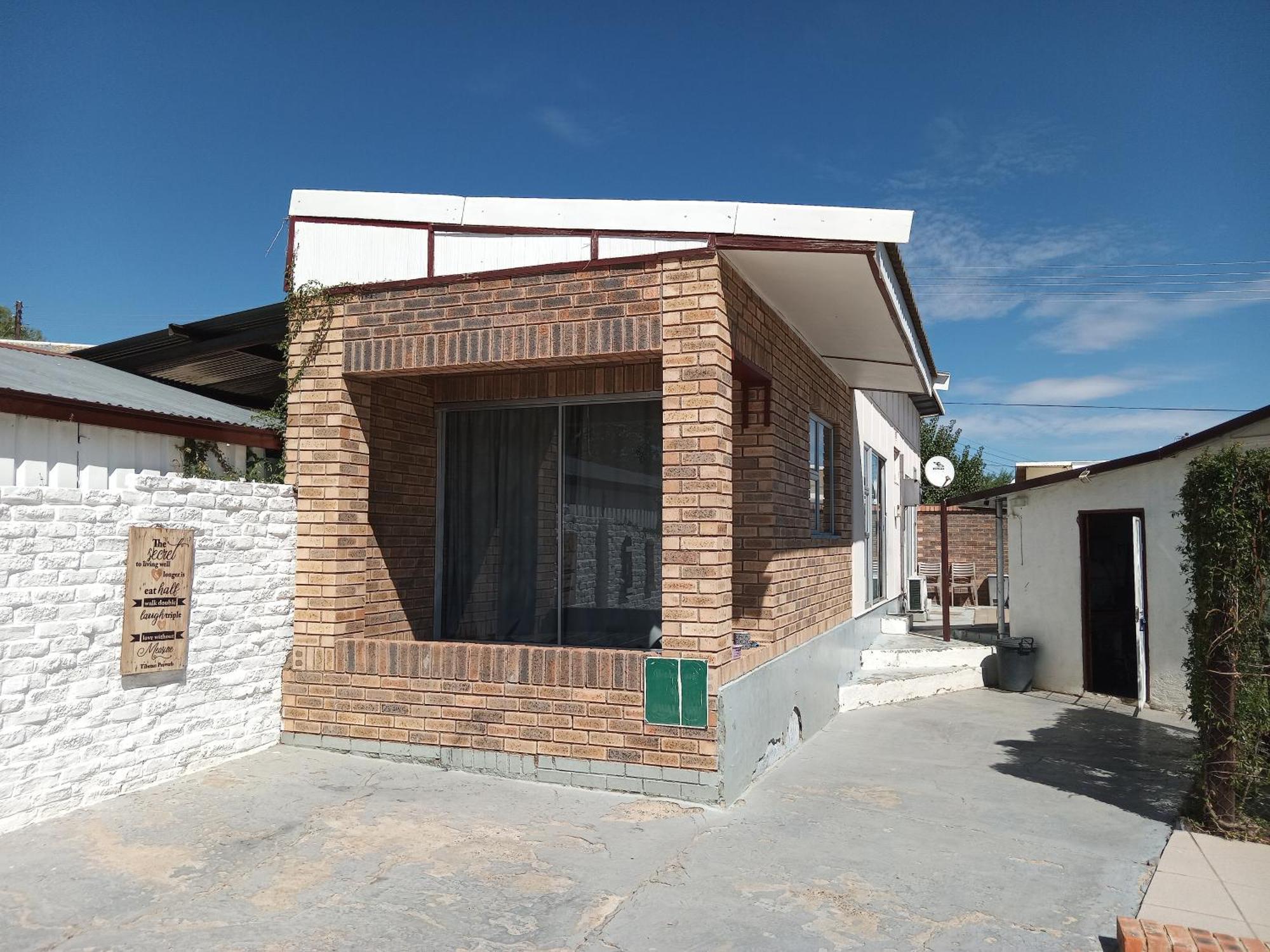 Sunrose Group Of Guesthouses Гарьеп-Дам Экстерьер фото
