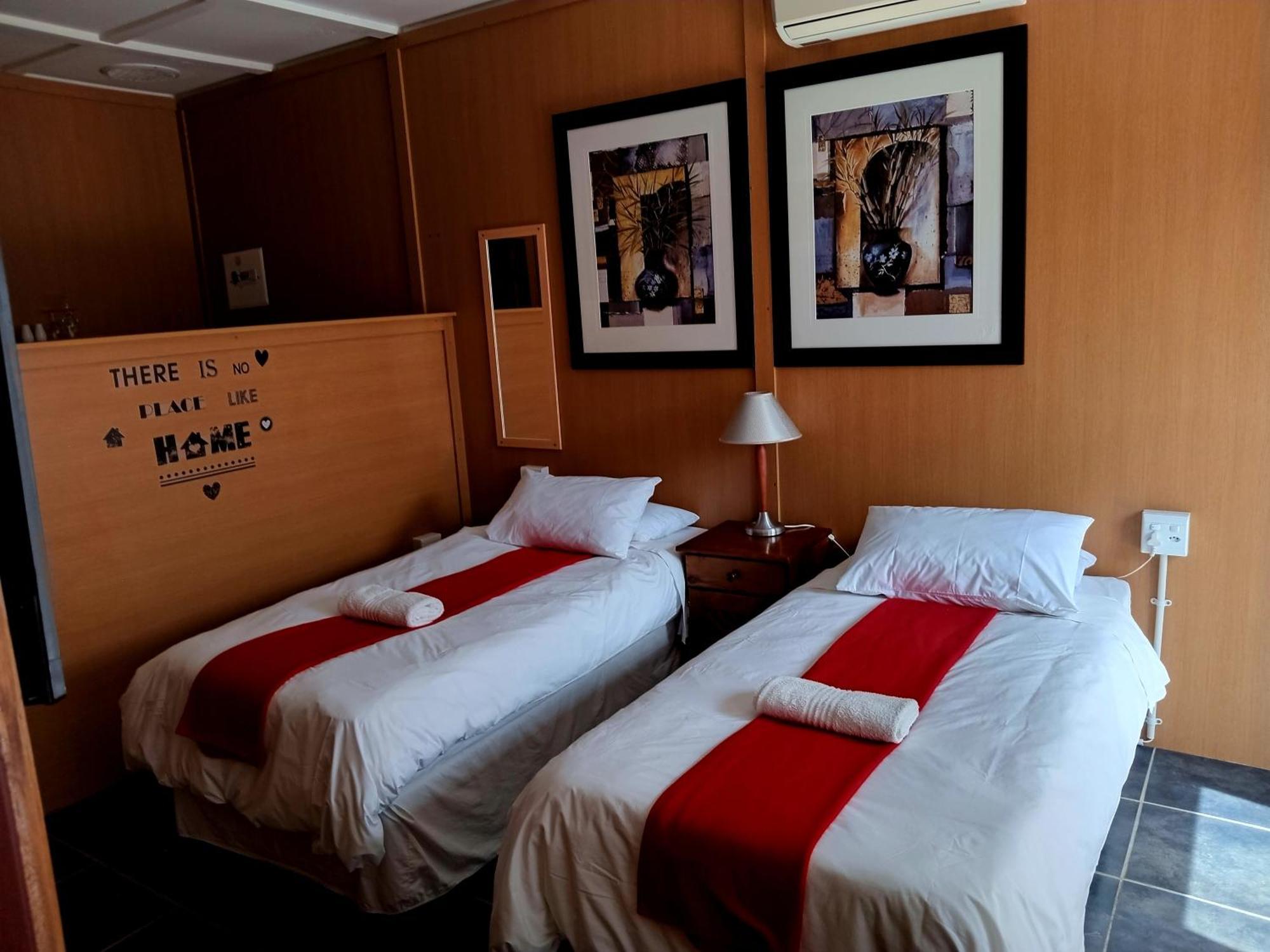 Sunrose Group Of Guesthouses Гарьеп-Дам Экстерьер фото