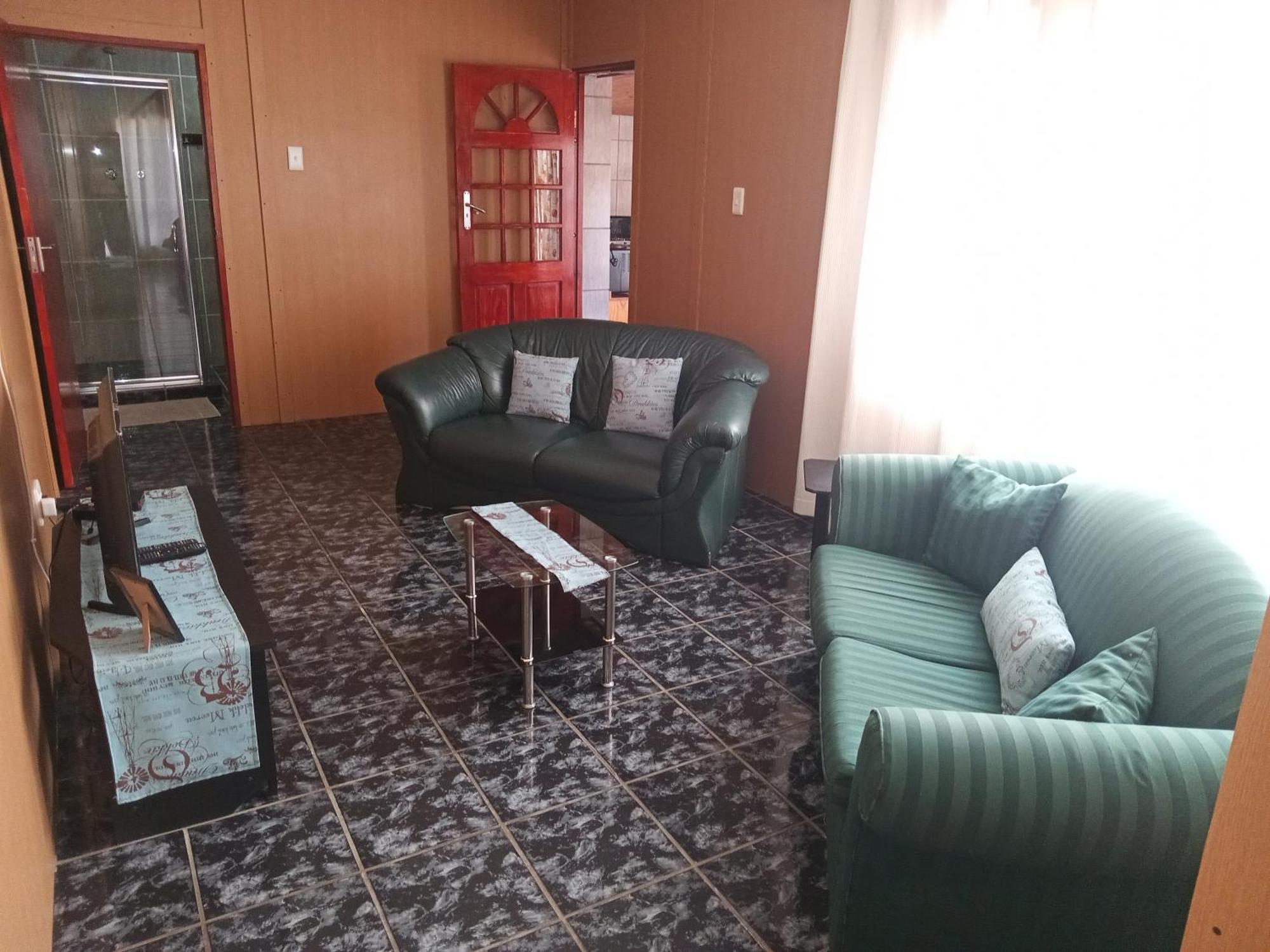 Sunrose Group Of Guesthouses Гарьеп-Дам Экстерьер фото