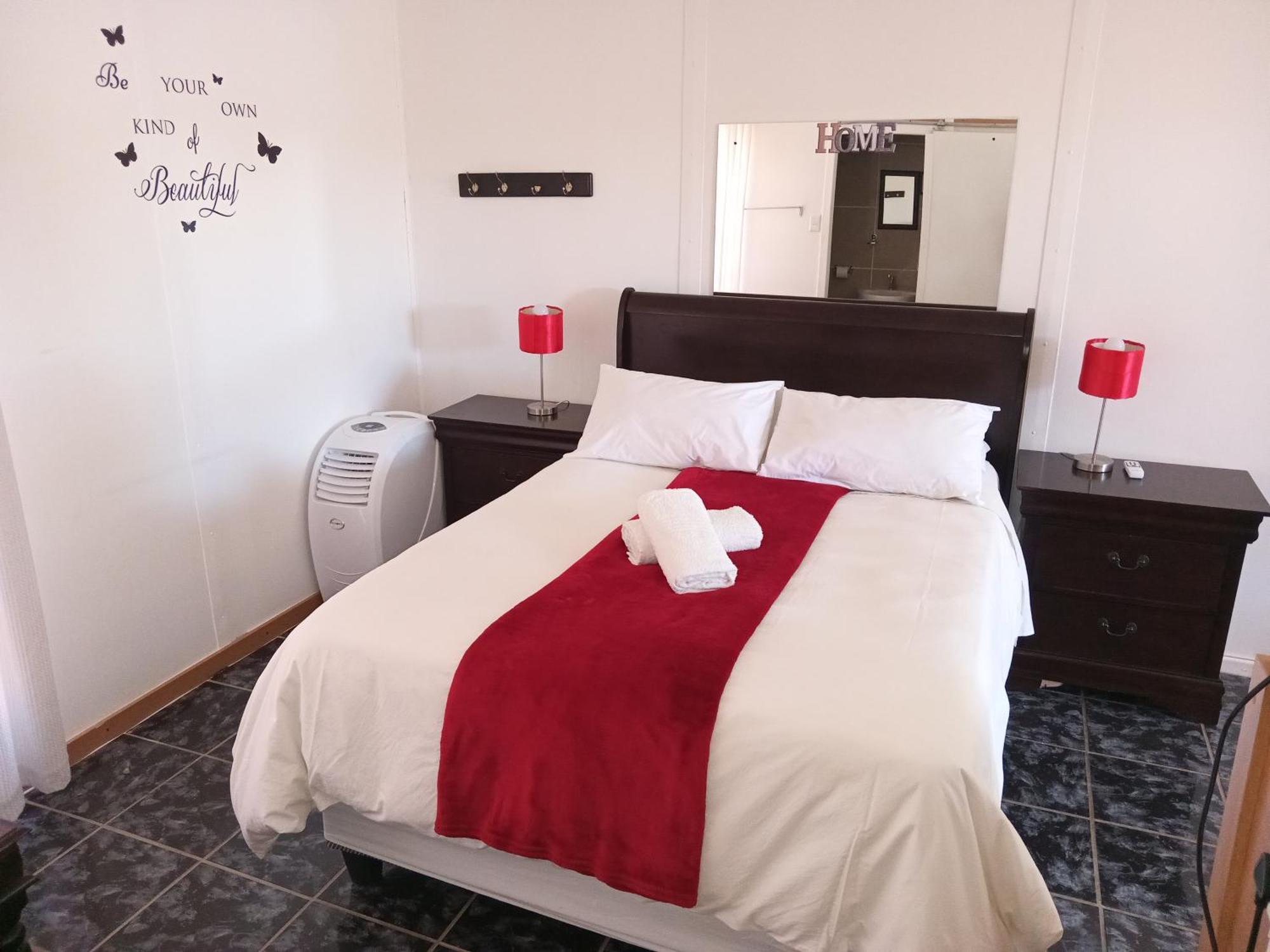 Sunrose Group Of Guesthouses Гарьеп-Дам Экстерьер фото